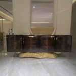 Luxury TV Stand with Bold Stone Top Textured Dark Finish Sculptural Stainless Steel Base and Cabinet Storage